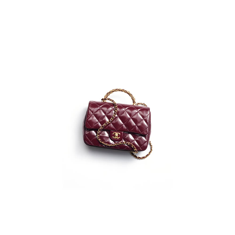 Ch*el flap bag with top handle